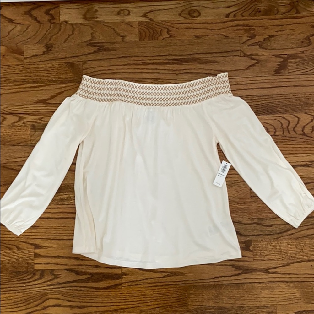 off the shoulder cream shirt